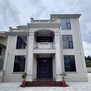 伊春 芝麻白石材别墅干挂案例展示